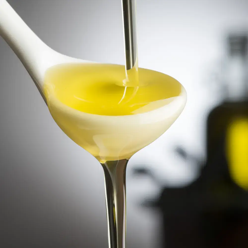 Ελαιόλαδο σε κουτάλι Εξαιρετικό παρθένο olive epitome